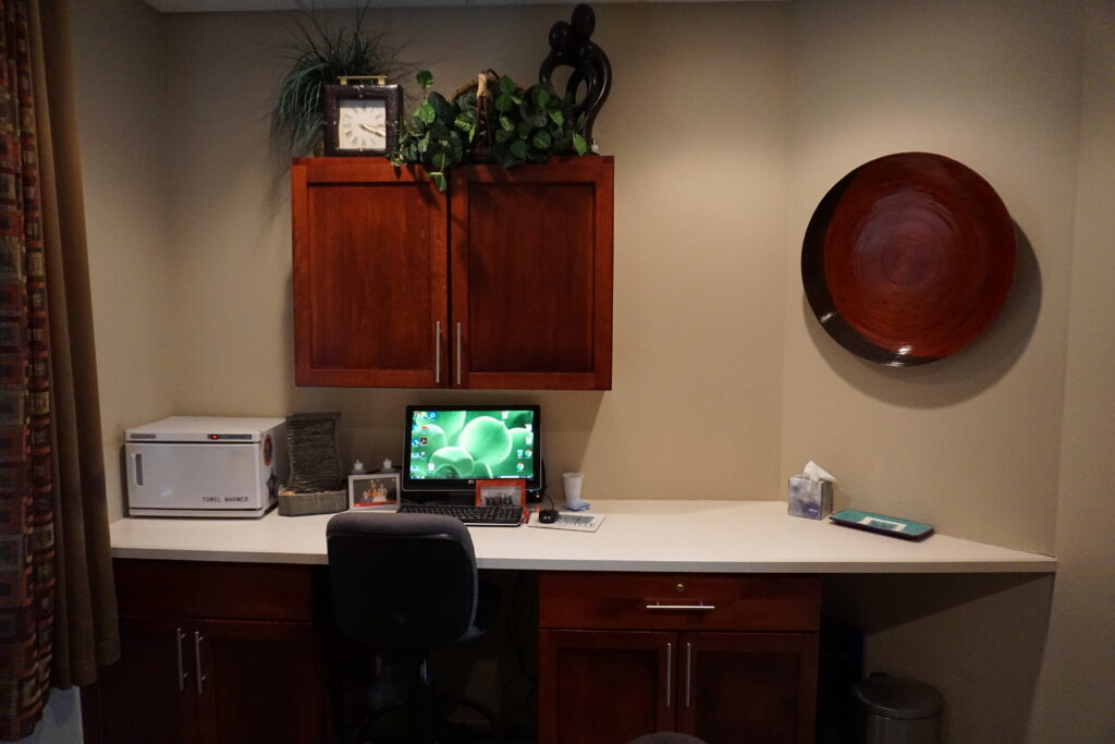 Desk in the licensed massage therapist room at the Bakeris Family Chiropractic in Coralville, Iowa