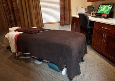 Bed in the massage therapist room at the Bakeris Family Chiropractic in Coralville, Iowa